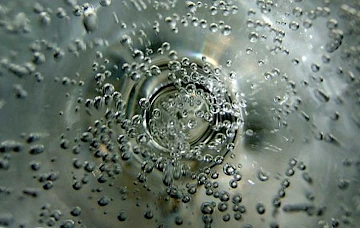 Water and macro-bubbles
