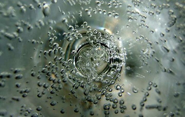 Water and macro-bubbles